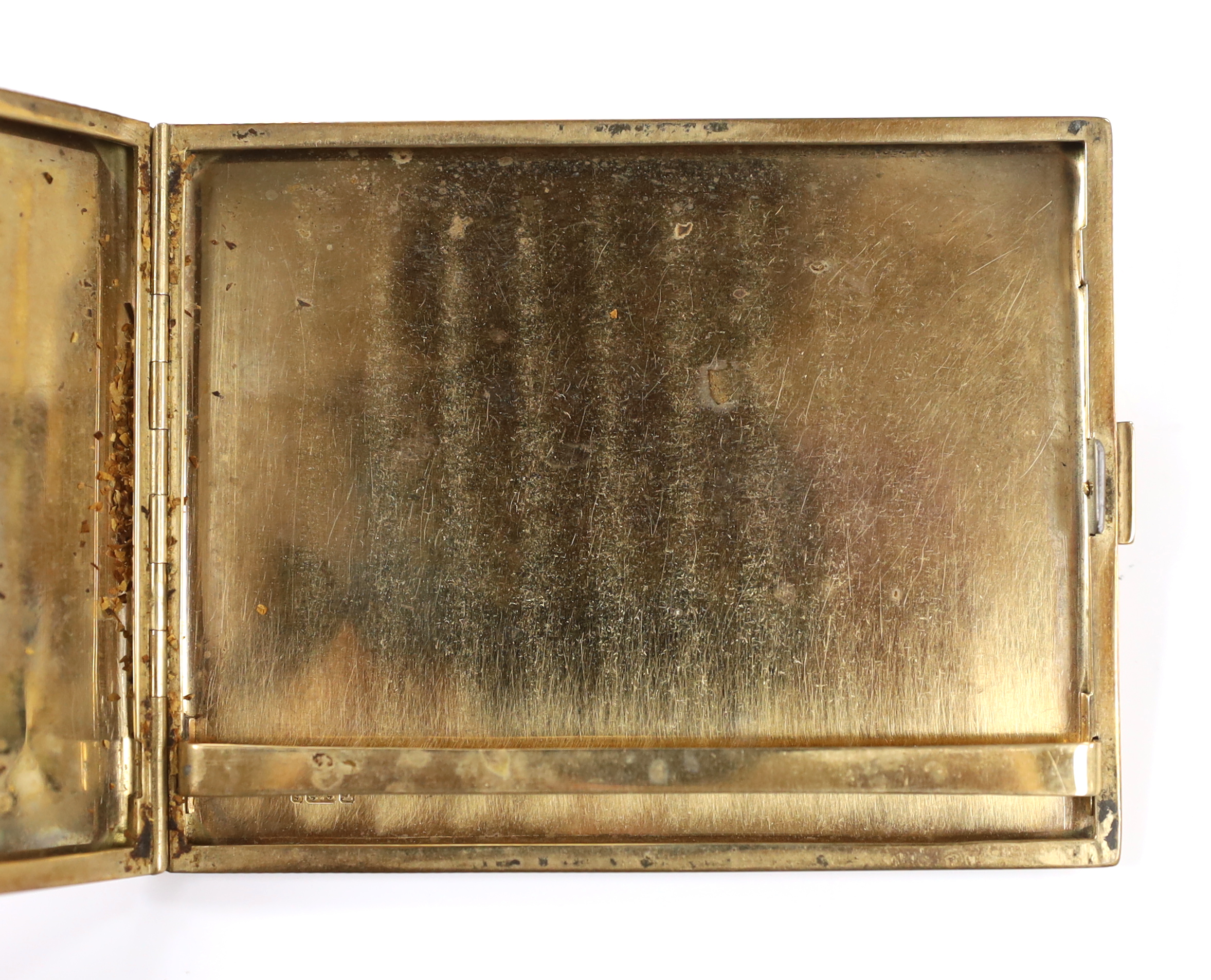 A George V engine turned 9ct gold cigarette case, Chester, 1925, 10.8cm, gross weight 132.7 grams.